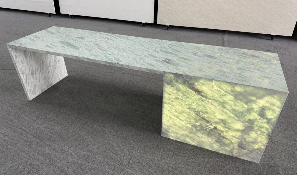 Backlit T111 Seascape sage green translucent stone bench installed in an Australian interior project