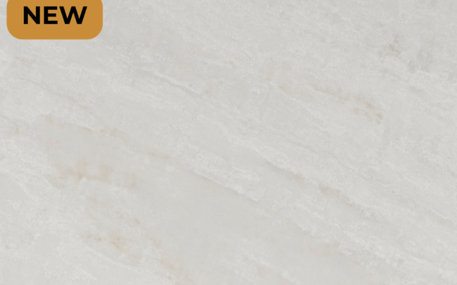 Ivory Glow engineered stone surface with soft tonal variations and natural movement.